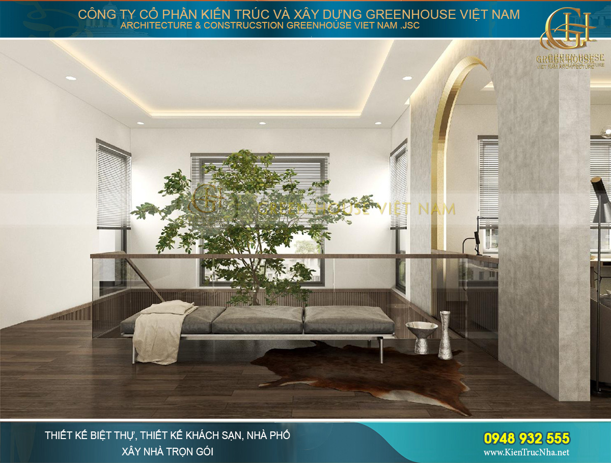 Khu vực sảnh tầng 2 tại giếng trời với một ghế nghỉ dài